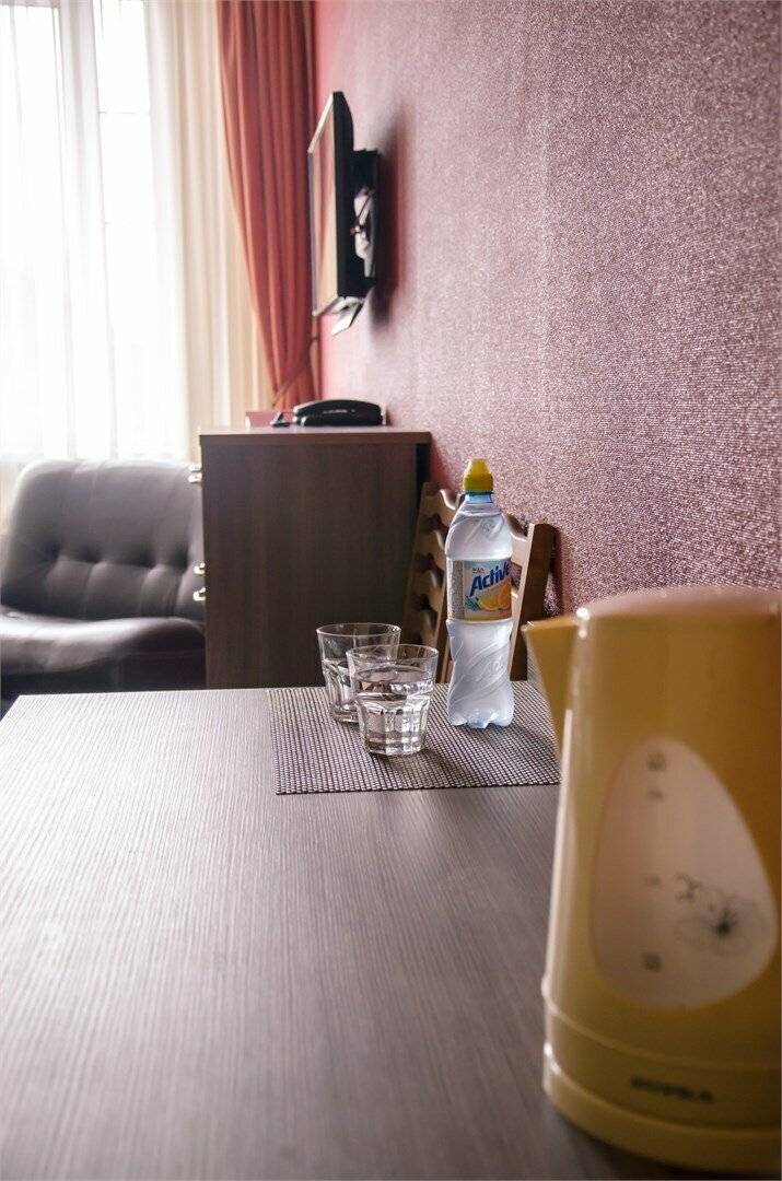 Фотографии номера Двухместный номер с 1 кроватью или 2 отдельными кроватями в Гостинице Камелот Псков