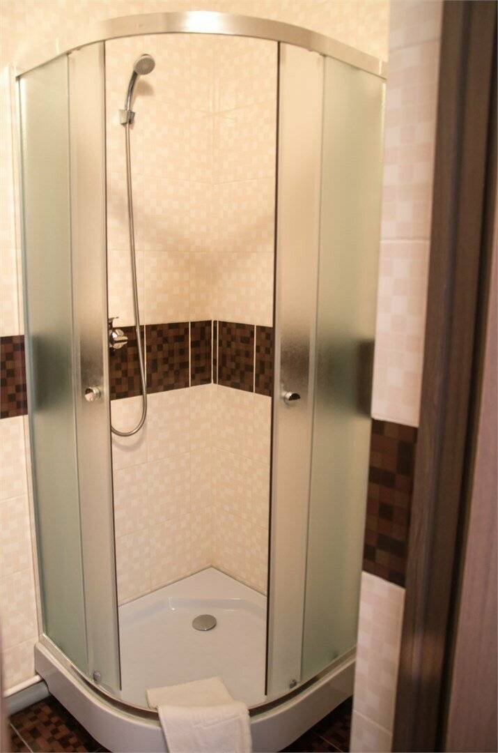 Фотографии номера Двухместный номер с 1 кроватью или 2 отдельными кроватями в Гостинице Камелот Псков