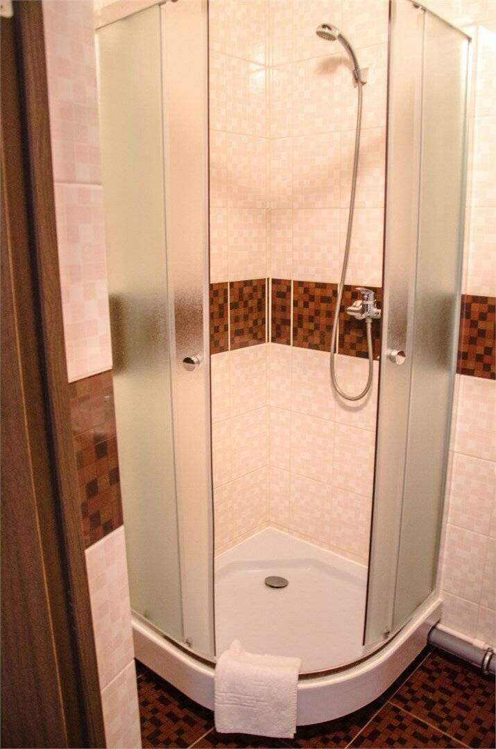 Фотографии номера Двухместный номер с 2 отдельными кроватями в Гостинице Камелот Псков