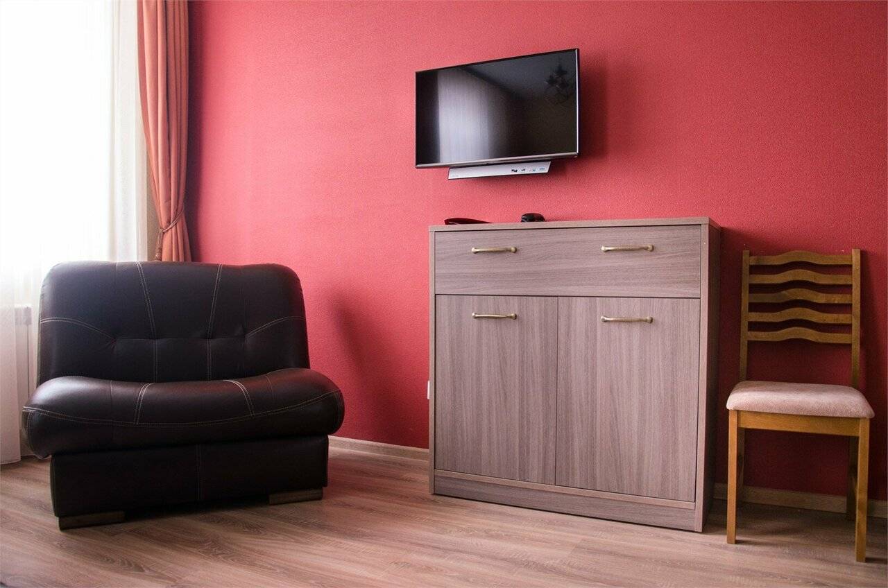 Фотографии номера Двухместный номер с 1 кроватью или 2 отдельными кроватями в Гостинице Камелот Псков