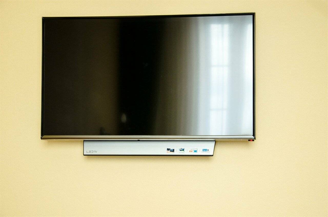 Фотографии номера Двухместный номер с 2 отдельными кроватями в Гостинице Камелот Псков